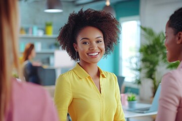 Multicultural businesswomen collaborate happily in modern co working space.