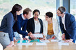 © peopleimages.com - Collaboration, teamwork and women with paperwork, boardroom and explaining to people and lobbyist. Business, talking and employees with documents, planning and communication in meeting and men