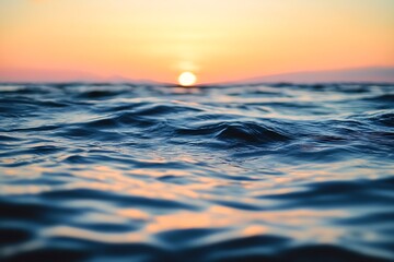 Canvas Print - Close up of water surface with blurry sunset in background, ocean, sea, water texture