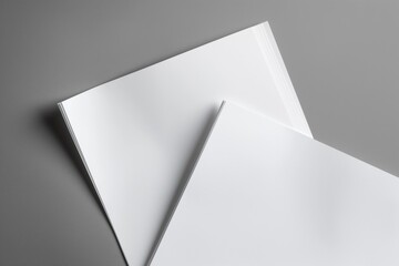Aufkleber - Blank paper sheets on grey background. Top view of paper stack for brochure mock up. Empty pages for printing business card, catalog, company booklet, flier, leaflet, letter, letterhead, mag,