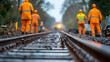 © Siasart Stock - Train Tracks Perspective: Railway Workers in Orange Suits
