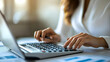 © Siasart Stock - Closeup Photo of Woman's Hands on Calculator