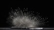 © miss irine - Dust particles react to strong neodymium magnet magnetic field on black background. Close-up of dust, magnet, and dark space. Magnetic force, texture, and dust movement.
