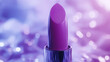 © MONWARA - A purple lipstick is on a purple background. The lipstick is shiny and has a purple tint