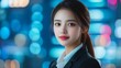 © Ndoomyim - Portrait of Confident Young Businesswoman in City Lights