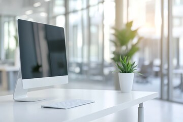 Poster - Minimalist workspace with a computer, keyboard, and plant on a white desk.