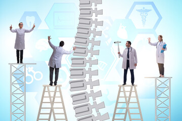 Wall Mural - Medical concept with doctors and spine