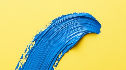 Poster - A striking blue brushstroke with a visible texture gracefully arcs across a solid pastel yellow background, showcasing artistic creativity in color
