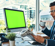 © SensSai/peopleimages.com - Green screen, computer and business man drinking coffee and reading newspaper in office with mockup space. Tea, news reporter and person at work with info, update and anchor check corporate article