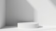 © Mitzuha - Minimalist white podium set against a seamless white backdrop, exuding elegance and simplicity, ideal for showcasing products or art in a clean, modern environment.
