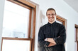 © Malambo/peopleimages.com - Portrait, arms folded and happy business man in creative startup for pride, career growth or opportunity. Face, glasses or smile of confident event planner, coordinator or entrepreneur in Switzerland