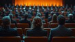 © Viktoryia - A diverse group of attendees sits attentively in a contemporary auditorium, absorbing a compelling speech delivered from the stage under warm ambient lighting