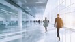 © Johannes - Bright business workplace with people in walking in blurred motion in modern office space