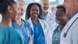 © wanchai - A group of healthcare professionals, including doctors and nurses of various races, genders, and ages, working together in a hospital setting. The image conveys the importance of diversity in health