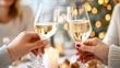 © JR-50 - A joyful celebration with two people toasting with fluted glasses of sparkling wine, surrounded by warm, festive lights.