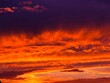 © OLENA - Sunset dusk sundown sky heaven fiery glowing clouds.