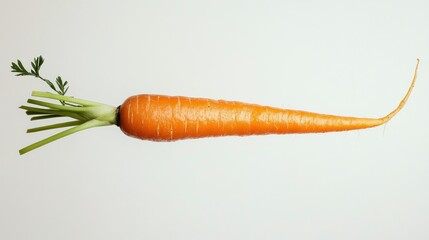 Poster - A Single Carrot with Green Tops on a White Background