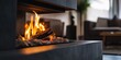 © VISUAL BACKGROUND - A fireplace with a fire burning in it in a living room