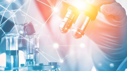Wall Mural - a close-up of a scientist's hand holding a microscope lens in a lab.