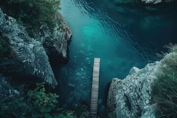 Aufkleber - A wooden bridge spanning across a serene body of water