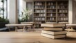 © ichzigo - Stack of Books on Wooden Table in Educational Setting