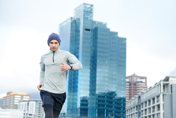 Canvas Print - Fitness, running and portrait of man in city for cardio jog, race or training for healthy body in Mexico. Sports, exercise and runner outdoor in urban town for wellness, marathon or workout in winter