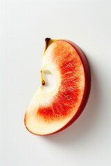 Poster - A fresh apple cut in half on a white background, ideal for use in still life photography or as a prop in food-related compositions