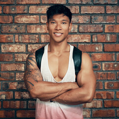 Canvas Print - Portrait, brick wall and Asian man with fitness, arms crossed and training with wellness. Face, healthy person and bodybuilder with confidence, pride and exercise with workout, bulking and challenge