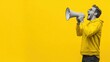 © Johannes - Black Friday flyer template with euphoric man on a yellow background using megaphone and copy space