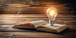 © janya - Light bulb and book on wooden surface, knowledge, education, inspiration, reading, creativity, learning, idea