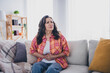 © deagreez - Photo of sick upset woman dressed checkered shirt feeling stomach ache indoors house apartment room