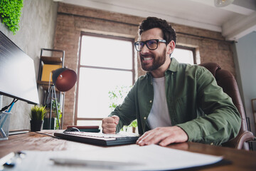 Poster - Portrait of professional hacker young man fist punch hit computer desk loft interior office indoors