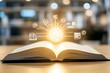 © Downloads - Open book with glowing sun and digital icons representing knowledge and education concepts