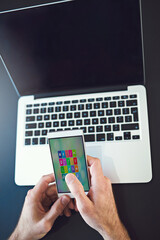 Aufkleber - Man, hands and phone by laptop for communication, social media or website at office desk. Creative person, screen and computer for freelance, mobile app design or UX test for startup technology