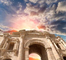 Arch of Hadrian in Gerasa (Jerash)-- was built to honor the visit of emperor Hadrian to Jerash in 129/130 AD, Jordan. Against the background of a beautiful sky with clouds