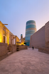 Wall Mural - Kaltaminor is a memorial minaret, located on the front side of the Muhammad Amin Khan madrasa in Khiva