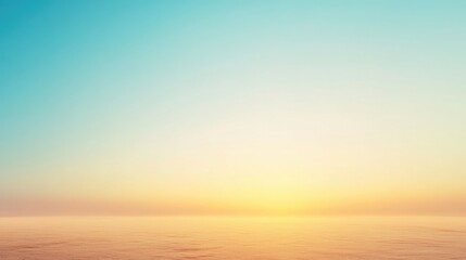 Wall Mural - Clear sky with a gradient from light blue to warm yellow at the horizon