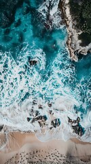 Wall Mural - Aerial View of Ocean Waves Crashing on Sandy Beach