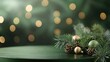 © irina - Christmas decorations on a green table with a tree behind