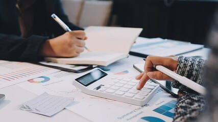 Canvas Print - Executives and managers are meeting in a conference room, on the table there are some documents about the company's finances, managers are discussing financial information with the management.