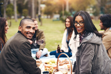 Canvas Print - Friends, portrait and outdoor picnic at park, diversity and together for bonding in countryside. Happy people, grass and support on trip to Rio de Janeiro, food and travel group on weekend holiday