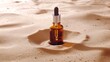 © atipong - Skincare with beauty cosmetic face serum. Glass brown bottle with a pipette on a natural background with sand. Essential oil for moisturizing body skin. Copy space
