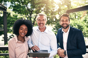 Poster - Happy, business people and portrait outdoor with laptop, teamwork and collaboration together. Park, plan and diversity with smile, staff and tech support with web design and startup and management