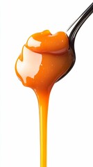 Caramel Sauce Dripping From Spoon - Delicious Sweet Treat.