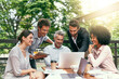 © JordaanExams/peopleimages.com - Laptop, support and collaboration with business people in cafe for meeting, planning and solution. Discussion, finance portfolio and brainstorming with employees in coffee shop for remote team