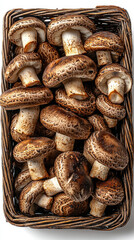 Wall Mural - A basket full of fresh, brown mushrooms.