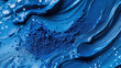 © Imane - vibrant blue powder texture on smooth surface for artistic design