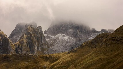 Wall Mural - Time-lapse footage of the dense footage covering the peaks of the Accursed Mountains in Montenegro