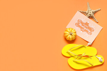 Wall Mural - Card for Thanksgiving Day with pumpkin, flip-flops and seashells on orange background