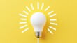 © atipong - Business creativity and inspiration concepts with lightbulb and pencil on yellow background. motivation for success.think big ideas